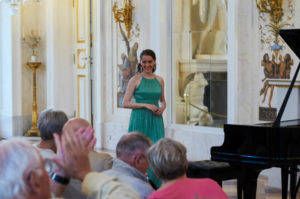 Pianist welcoming the audience